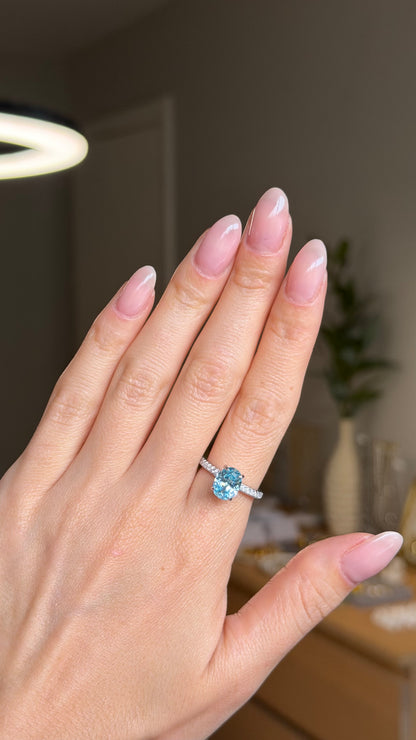 925 sterling silver ring with a blue cubic zirconia stone