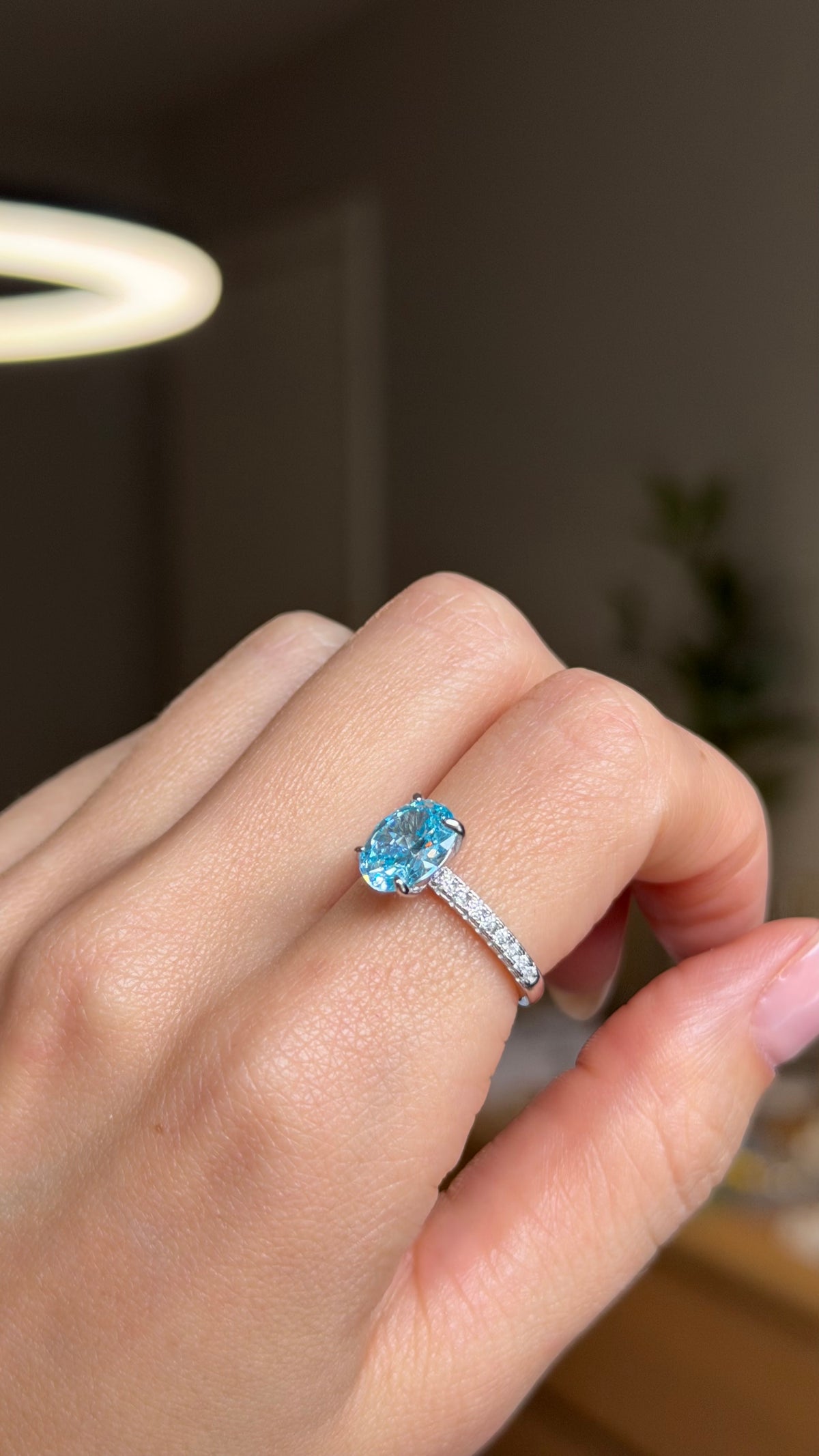 925 sterling silver ring with a blue cubic zirconia stone