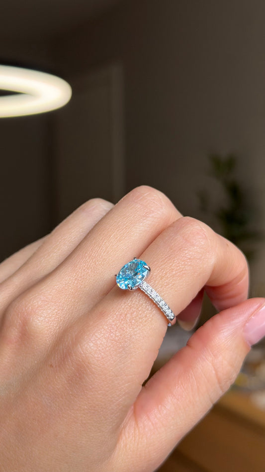 925 sterling silver ring with a blue cubic zirconia stone